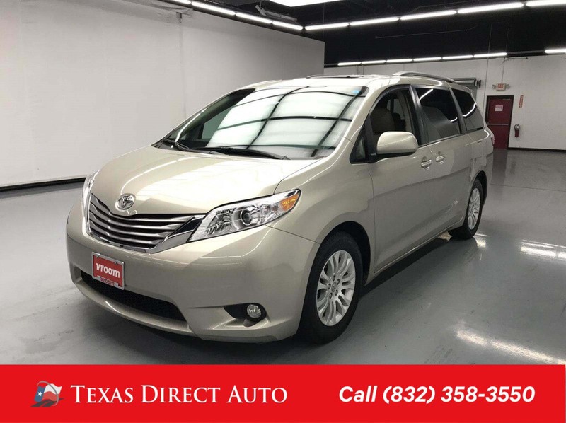 tan toyota minivan